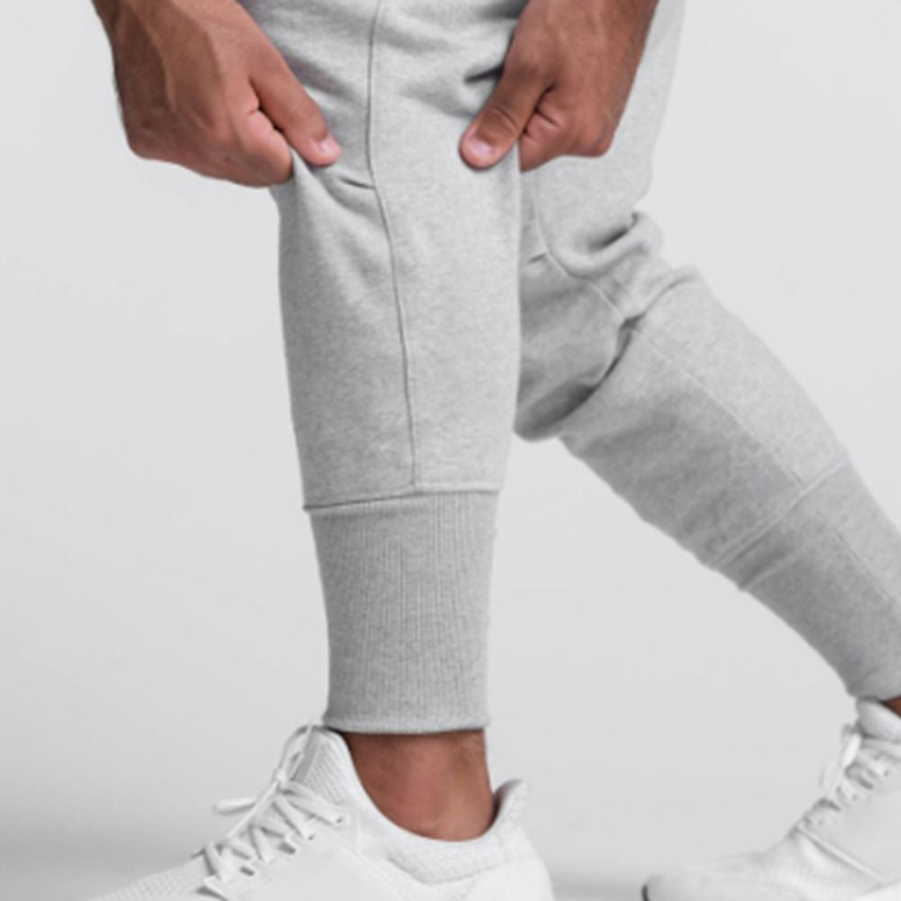 PANTALON DE BUZO POWER CALF JOGGER GRIS CLARO