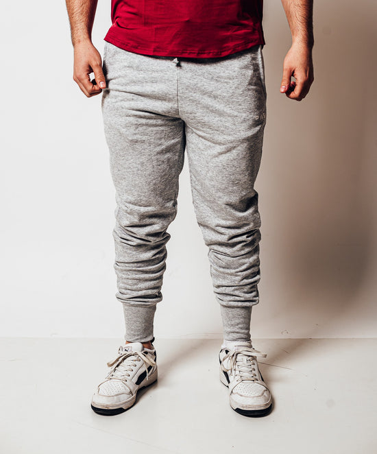 PANTALON DE BUZO POWER CALF JOGGER GRIS CLARO